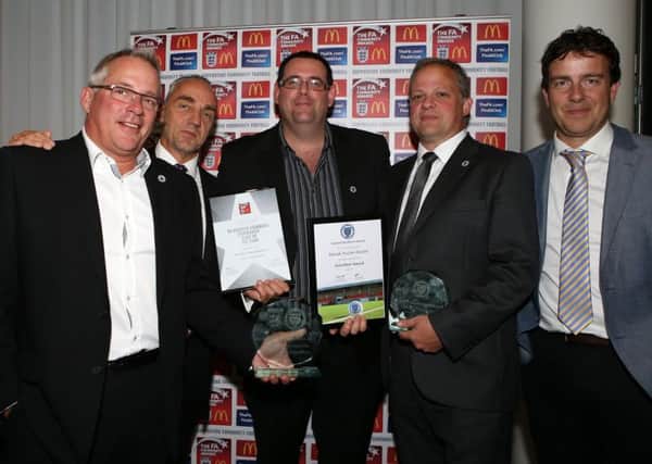 Steyning Towns Marco Spano, Ian Nicholls, Dave Shepard, Daniel Fuller-Smith and Richard Woodbridge collect the awards. Picture by Simon Roe