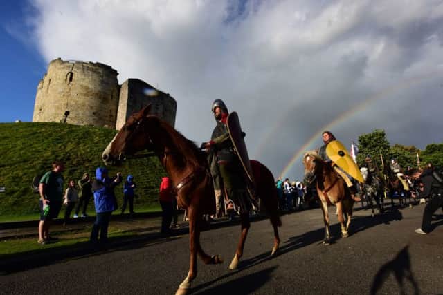 A double rainbow greeted the marchers as they prepared to leave Clifford's Tower in York on Sunday. Picture: Anthony Chappel-Ross for English Heritage SUS-160929-143906001