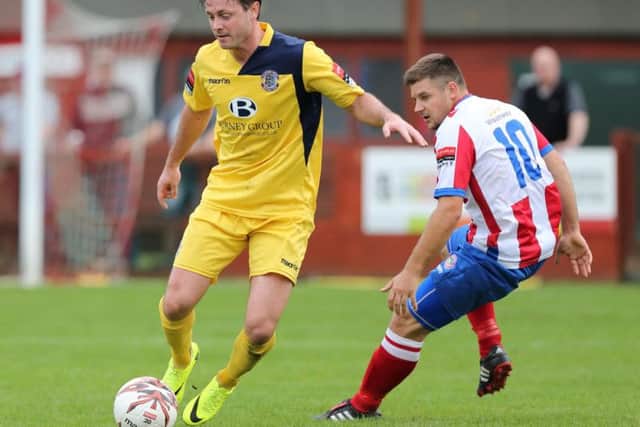Hastings United forward Frannie Collin on the ball against Dorking Wanderers. Picture courtesy Scott White