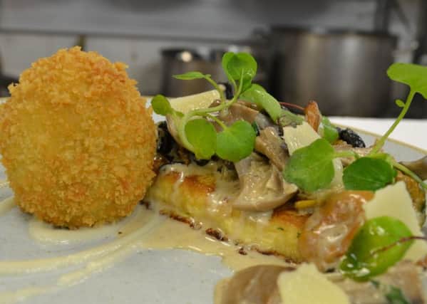 Wild mushrooms on French toast with crispy duck egg