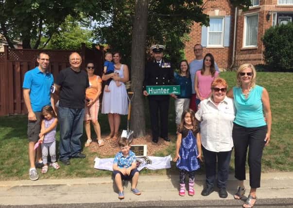 Chief Petty Officer Lee Hayward travelled 3,500 miles to the town of Ajax in Ontario, Canada, to visit a street now named after late grandfather, Stewart Hunter.