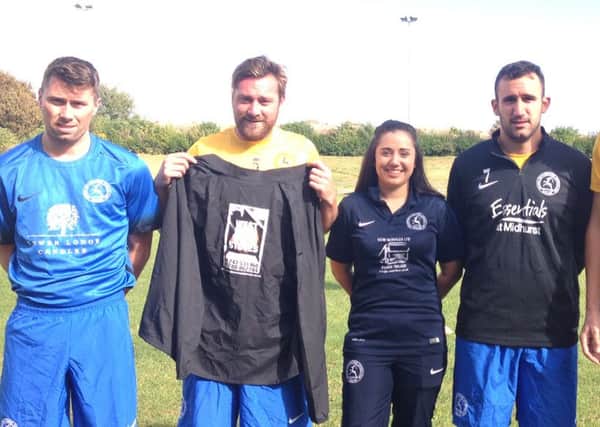 Midhurst's players and physio show off some of the newly-sponsored gear