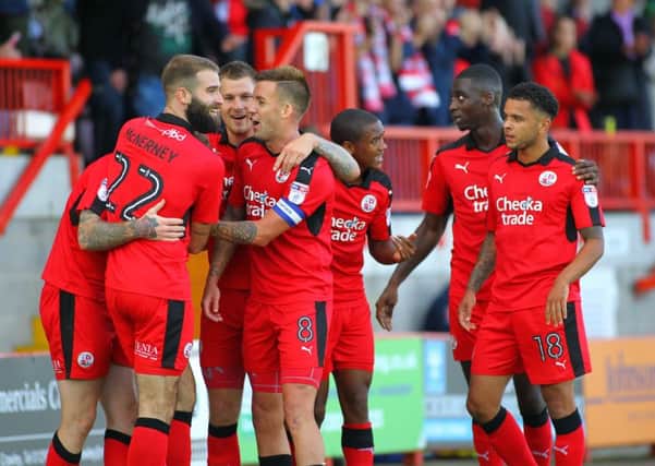 The Crawley team celebrates Mark Connelly's first goal during the Sky Bet League Two match between Crawley Town and Blackpool at the Checkatrade Stadium in Crawley. October 1, 2016.
Jack Beard / +44 7554 447 461 SUS-160110-164022008