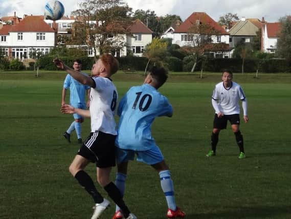 Wayne Giles in the thick of the action for Bexhill United against Billingshurst. Picture courtesy Mark Killy