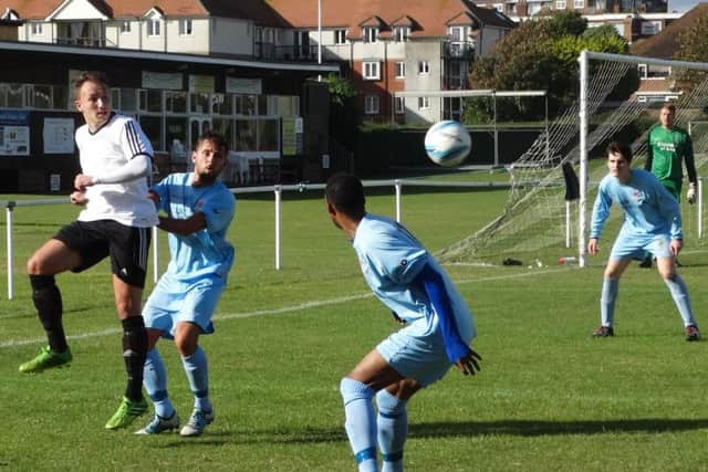 Gordon Cuddington lays the ball off during Bexhill's 5-1 win. Picture courtesy Mark Killy