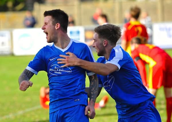 Geroge Gaskin (left) struck twice as Shoreham saw off Peacehaven & Telscombe on Saturday. Picture: Stephen Goodger