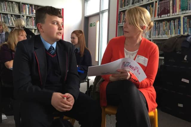 Business volunteer Sue Monopoli with one of the Bexhill Academy students SUS-160510-094341001
