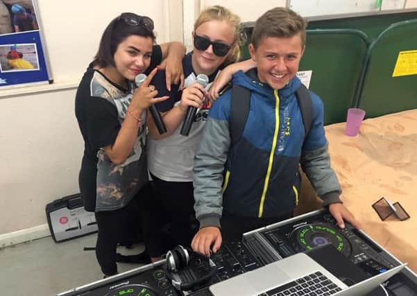 Thea Garwood, Charlee Sadler and Sam Hoodless, regular attendees at the club, at a DJ skills event