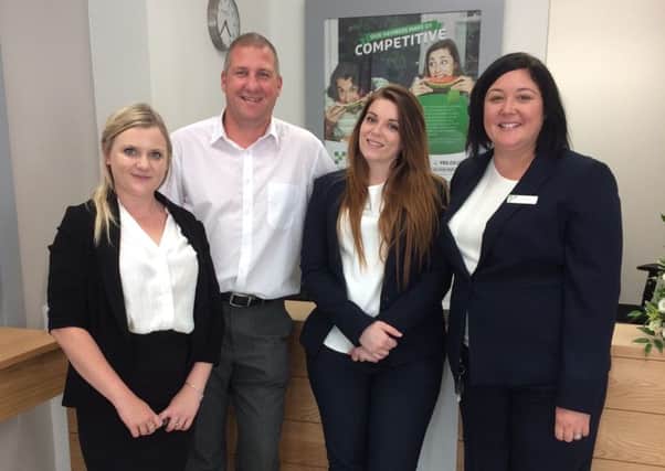Natasha Strudwick, Roger Croft, Louise Chadwick and Sapphire Novell celebrate the opening of the Yorkshire Building Society agency in Chichester