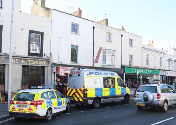 Police searched three properties in the town centre this morning (October 5)