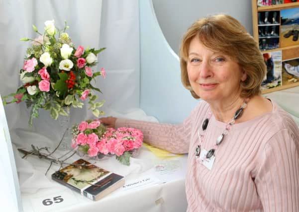 Gill Robbins with her first prize winning arrangement. Picture: Derek Martin DM16147192a
