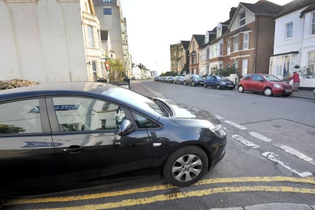 Bexhill parking on double yellow lines. SUS-161110-133727001