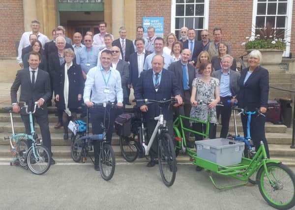 Delegates outside County Hall before the West Sussex Cycle Summit starts SUS-160710-130055001