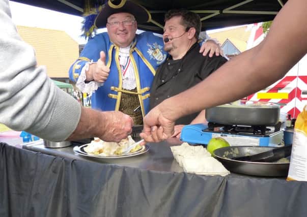 Worthing town crier Bob Smytherman with singing chef Jonathan Nulty