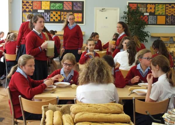 Pupils tuck into soup and bread for lunch on Harvest Fast Day instead of their much-loved fish and chips
