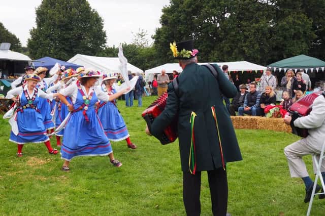 Fishbourne Mill Morris kept traditions alive with their hankies, bells and sticks swinging. Picture: V. Trownson