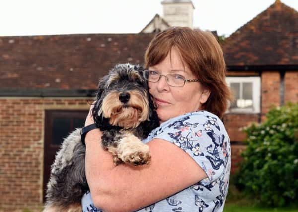 Facing homelessness: Gill Cowie and her pet dog Lucky