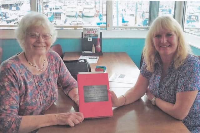 Ruth Brown and Andrea Martin with the Littlehampton School Logbook