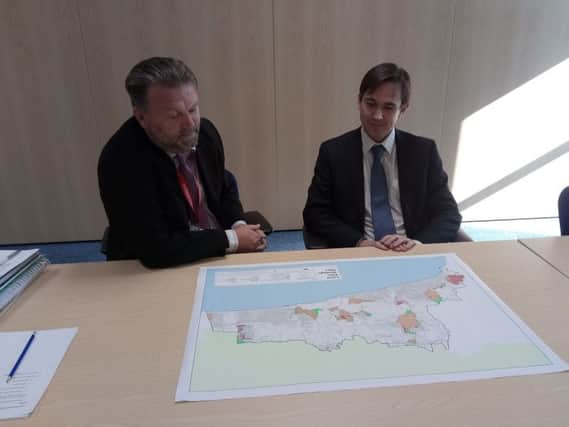 Arun District Council director for planning and economic regeneration Karl Roberts and planning policy team leader David Coleman assess a map of sites being tested as part of the local plan SUS-161110-162257001