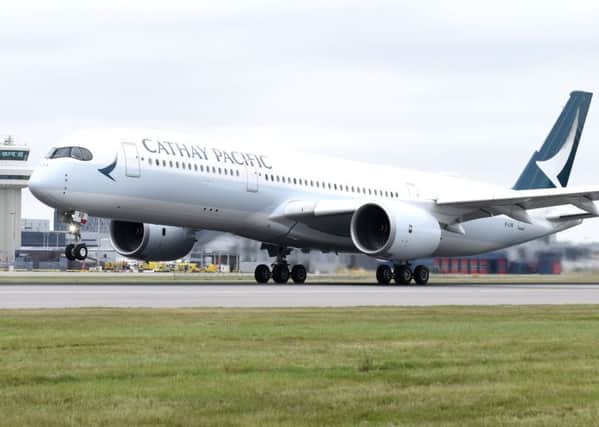 Gatwick Airport's first Cathay Pacific flight taking off