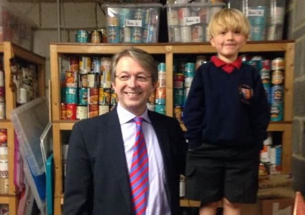 Oscar in the hostel larder with Stonepillow chief executive Geoffrey Willis
