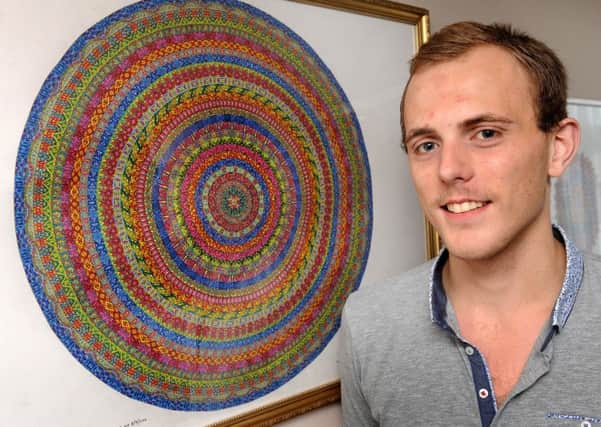 Liam Thompson whose Aspergers' has enabled him to be a creative artist. He has overcome his difficulties and is trying to carve a career in art. Pic Steve Robards  SR1631125 SUS-161019-135635001