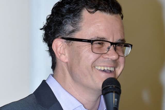 Dominic Holland