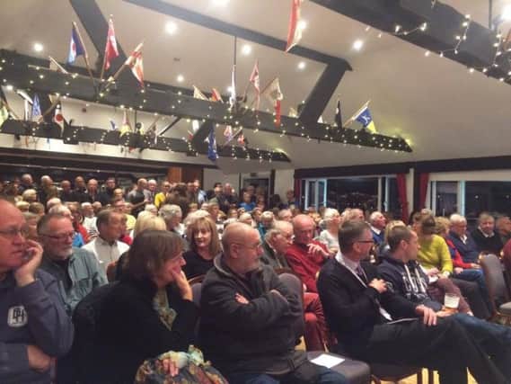 Residents packed Sussex Yacht Club for the debate