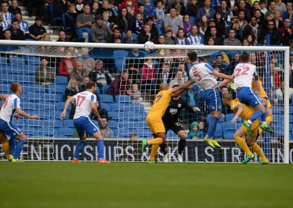 Lewis Dunk heads just off target in the first half. Picture by Phil Westlake (PW Sporting Photography)
