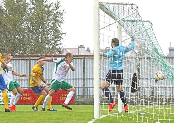 James Fraser heads the Rocks' winner against AFC Sudbury / Picture by Tim Hale