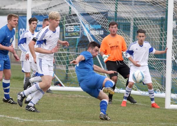 Rustington's Dale Campbell fires in a shot on Saturday