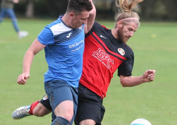 Lancing United's Tom Donnelly (right)