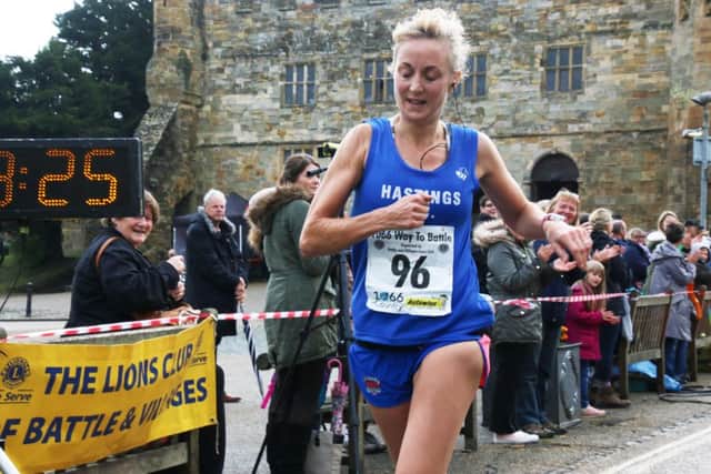 Karen Murdoch is all smiles as she finishes first lady. Picture courtesy Alan Roberts