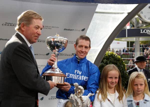 Jim Crowley receives the champion's trophy / Picture by Clive Bennett - see more images at www.polopictures.co.uk