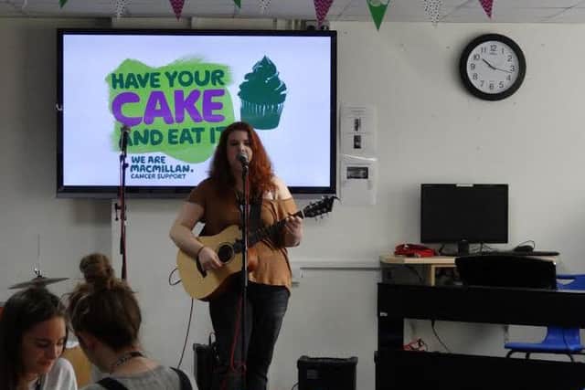 Students perform at the coffee morning