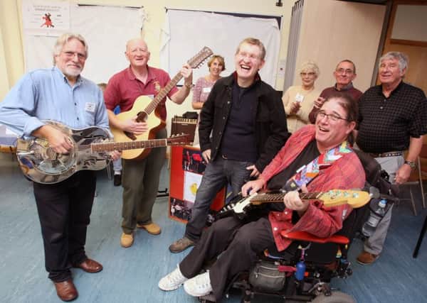 Members of the band and others at the Littlehampton U3A oepn day. Photo by Derek Martin DM16148527a
