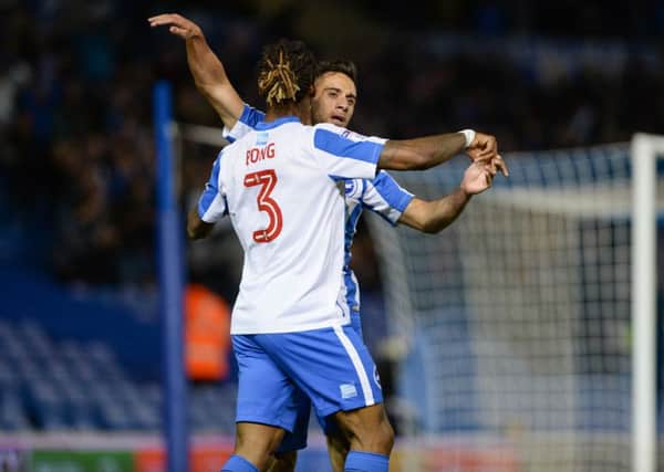 Sam Baldock celebrates putting Albion 1-0 ahead with Gaetan Bong. Picture by Phil Westlake (PW Sporting Photography)