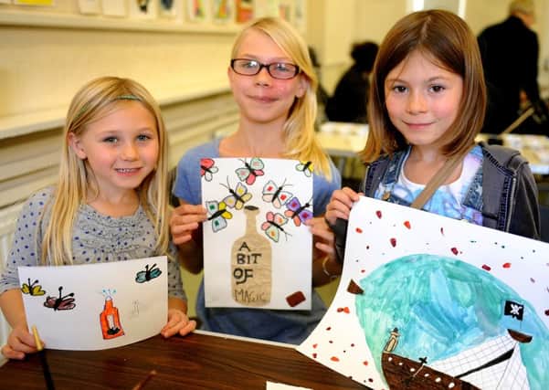 Olivia, Milly and Erin Pattison show off their pieces