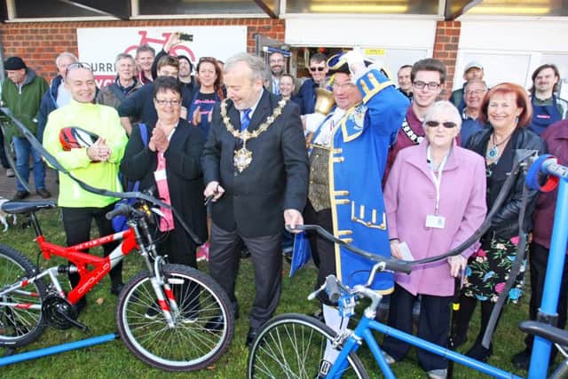 Worthing mayor Sean McDonald officially opens Durrington Community Cycle Project's new premises, with support from Worthing town crier Bob Smytherman. Pictures: Derek Martin DM16150104a