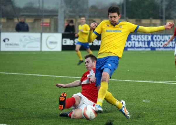 Ross Adams, pictured in action for Lancing last season, netted twice in Steyning's victory last night. Picture: Derek Martin DM1610285