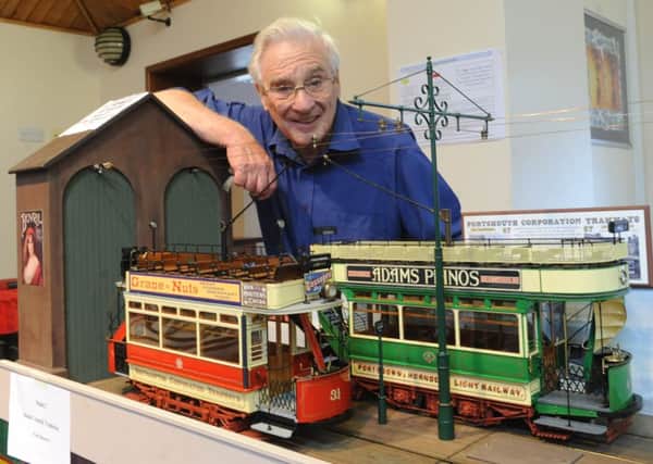 Tram builder Peter Howard exhibiting at a previous Chichester Lions Club model railway exhibition.


Picture by Louise Adams C131437-1