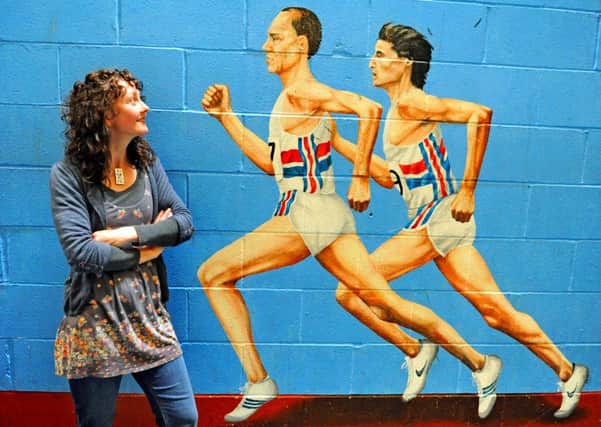 JPCT 210513 S13210023x Artist Alison Ingram at BBH Leisure Centre with a mural she created at the indoor athletics facility known as the tube-photo by Steve Cobb ENGSUS00120130521103629