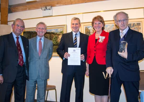 The Queens Award for Voluntary Services is presented to the Community Minibus Association (West Sussex). Left to right: Sir Brian Barttelot, (President) , Simon Knight (Deputy Lord Lieutenant, West Sussex), Alistair Sheppard (Chairman), Susan Pyper (Lord Lieutenant , West Sussex), Rodger Hunt (Honorary Vice President)