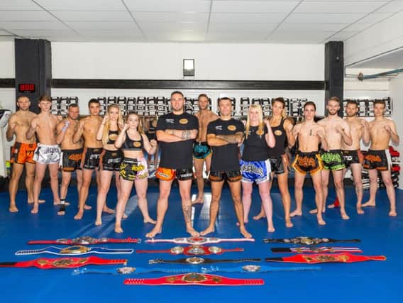 The Fighting Tigers Gym squad of, from left, Jimmy Killick, Elliott Hallworth, Ryan Turner, Benjamin Beal, Lucy Brown, Jemima Beal, Andy Chambers, Henri Burnham, Luke Read, Siobhan Keppler, Amy Campbell, Todd Williams, George Jacobs, Merlin Gallery and Isaiah Benjamen.
