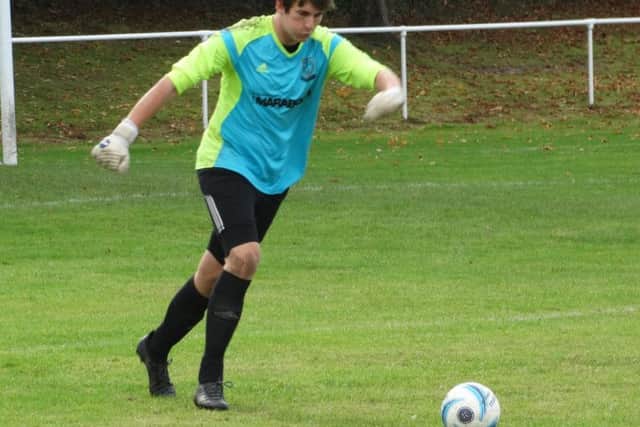 Bexhill United goalkeeper Dan Rose prepares to kick the ball downfield against Storrington. Picture courtesy Mark Killy