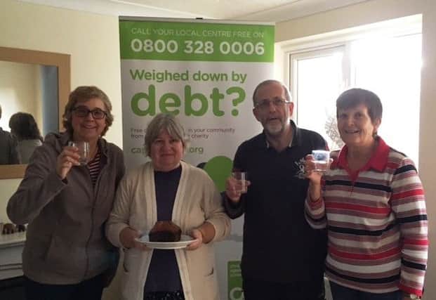 Staff at Littlehampton Debt Centre have pledged to drink only water for 20 days