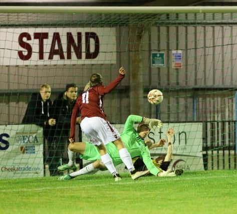 Harry Stannard scores the first Hastings United goal against Herne Bay. Picture courtesy Scott White