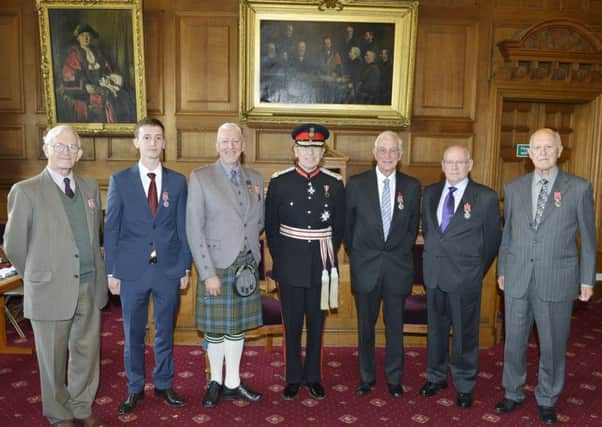 John Pulfer, pictured second from right, with the Lord Lieutenant and the other BEM recipients