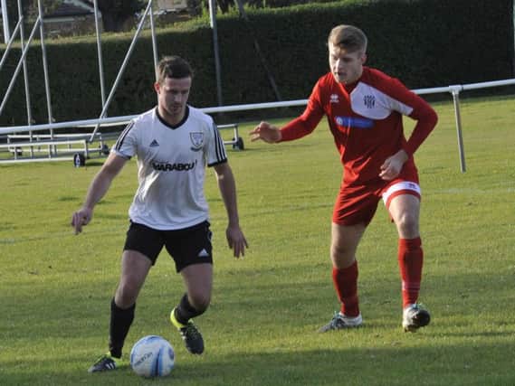 Kevin Barden on the ball for Bexhill United against East Preston. Picture by Simon Newstead