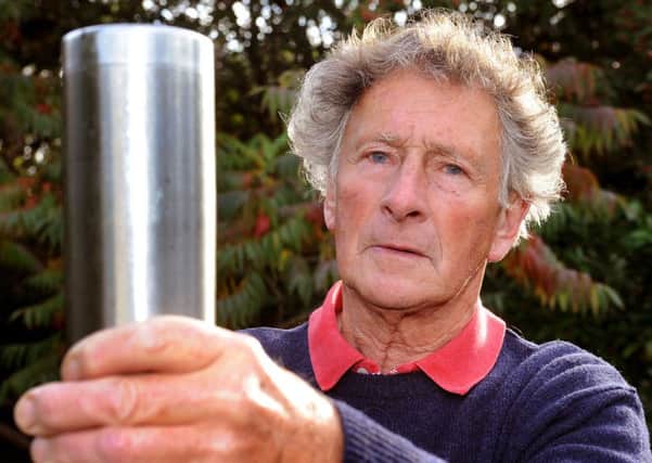 Christopher Van Heldon who saw a UFO (very similar to the object he's holding) while walking across Worthing golf course. Pic Steve robards SR1631233 SUS-161023-123151001
